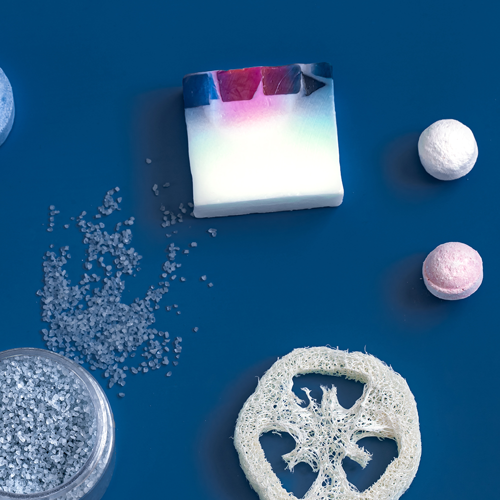 different body care items on blue color.